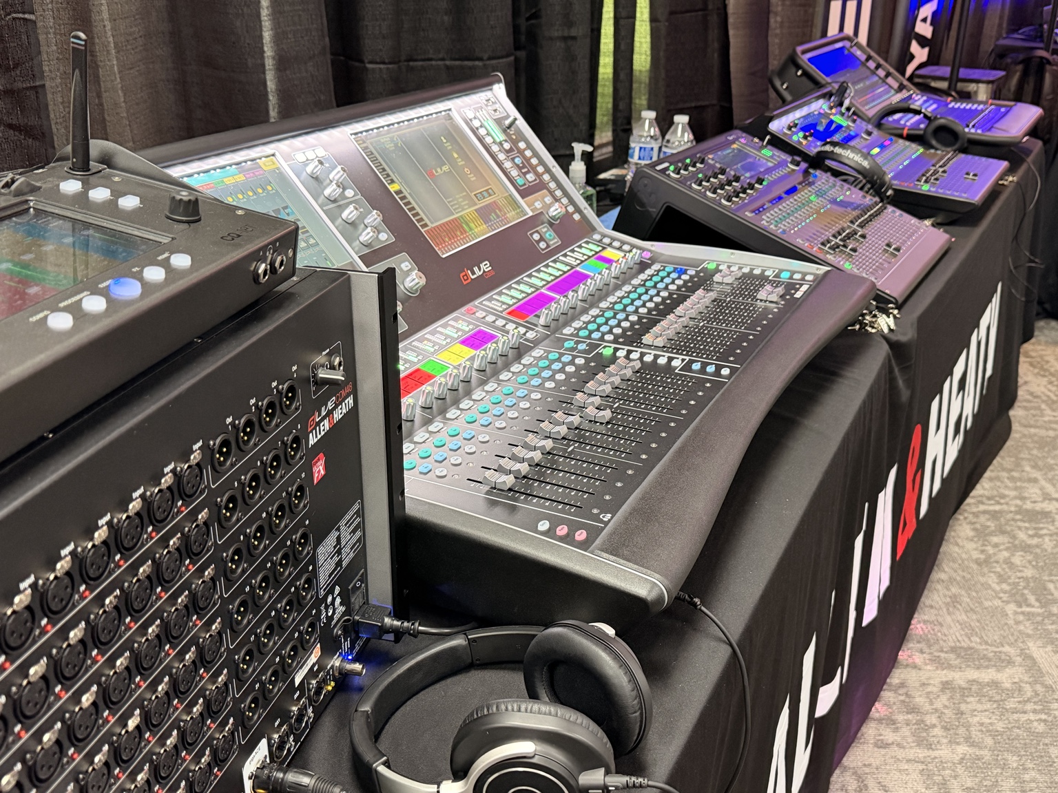 Allen & Heath digital mixing consoles and audio equipment on display