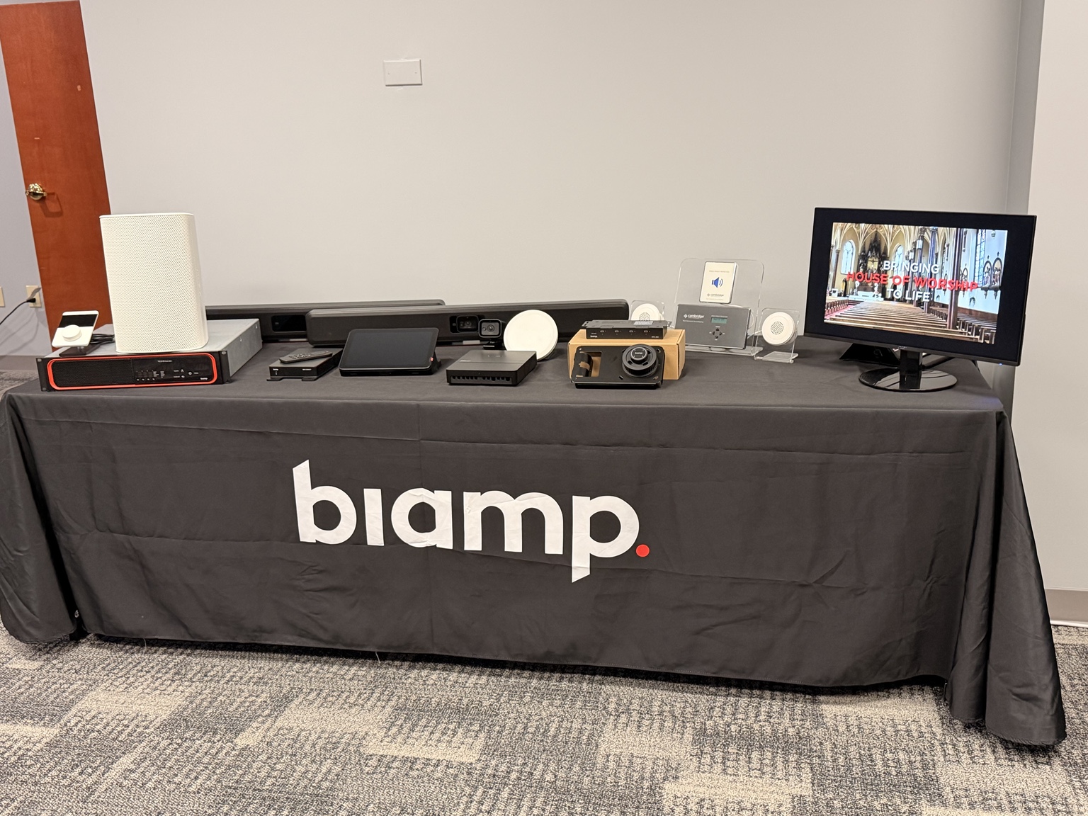 Biamp commercial AV and sound masking equipment on a demonstration table